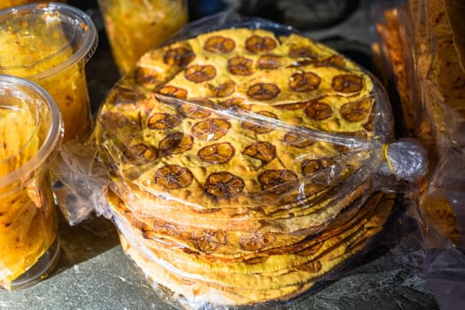 Vietnamese crispy pancakes with bananas on street food in Da Lat