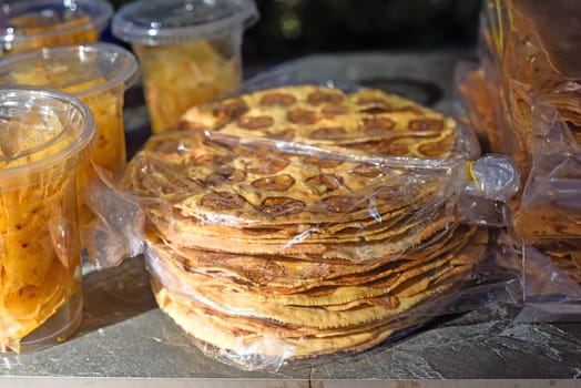 Vietnamese crispy pancakes with bananas on street food in Da Lat