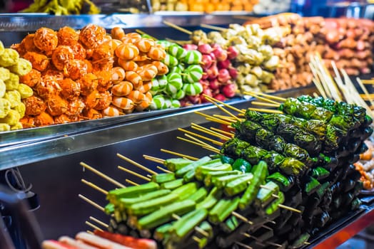 Many snacks and seafood in vietnamese night market in Da Lat