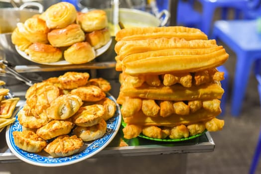 pastries with custard cream in night market of street food in Da Lat in Vietnam