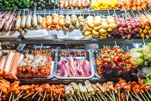 Many snacks and seafood in vietnamese night market in Da Lat