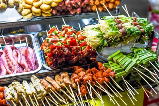 Many snacks and seafood in vietnamese night market in Da Lat