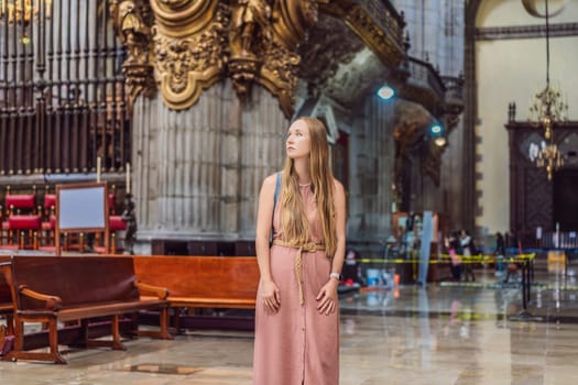 Female tourist exploring the Metropolitan Cathedral in Mexico City. Woman admiring the architecture and history of Mexico's iconic landmark. Concept of cultural heritage, religious tourism, and travel discovery.
