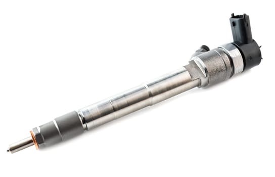 New fuel injector on white background close up