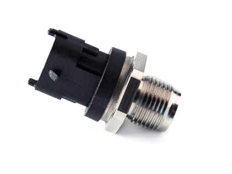 New rail fuel pressure sensor on white background close up