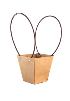 Plym package bag for flowers made of corrugated cardboard on white background