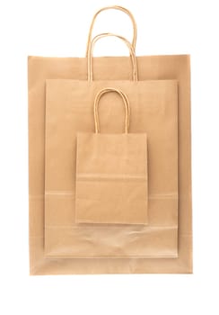 three craft bags with twisted handles on white background
