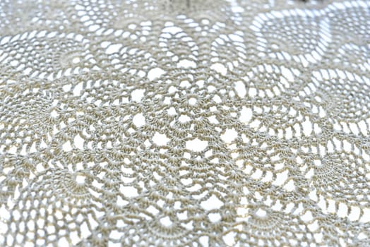 Various knots of macrame technique made of white threads