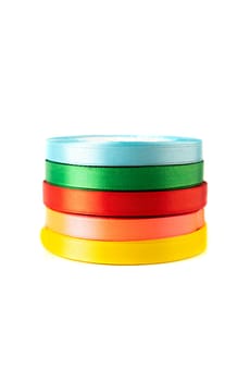 set of multi-colored satin ribbons for gifts on white background