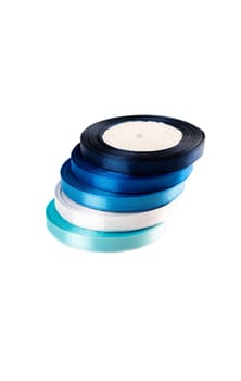 set of multi-colored satin ribbons for gifts on white background