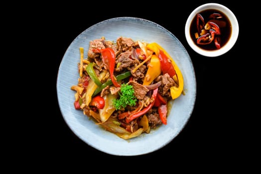 Satay fried beef with with pepper in vietnamese style for a menu