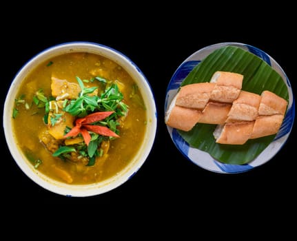Vietnamese pumpkin Soup on black background