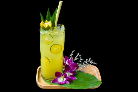 Fresh drink with Kumquat and citrus juice isolated on black background