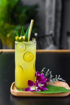 Fresh drink with Kumquat and citrus juice isolated on black background
