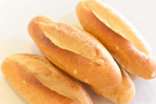 Vietnamese traditional Banh Mi baguette on white background