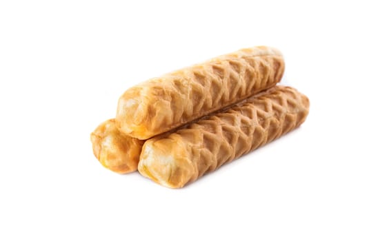 Pile of asian breadsticks with cheese flavor isolated on white background