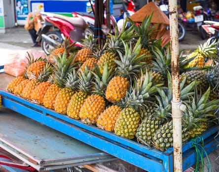 Many pineapples for sale in the market