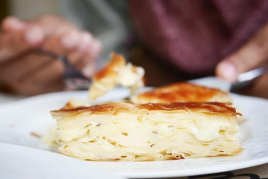 A close-up of a tasty homemade pastry served warm.
