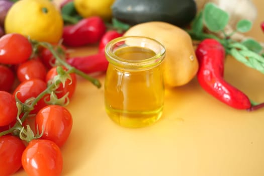 Colorful mix of vegetables and olive oil displayed together