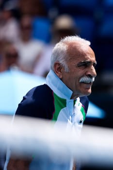 MELBOURNE, AUSTRALIA - JANUARY 10: Mansour Bahrami of France partners Iva Majoli of Croatia in the Legends mixed doubles against Pat Cash and Rennae Stubbs of Australia ahead of the 2025 Australian Open at Melbourne Park on January 10, 2025 in Melbourne, Australia.
