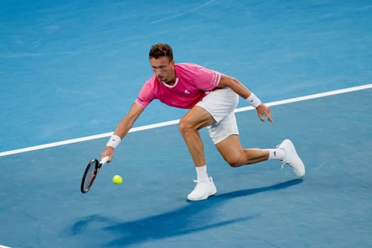 MELBOURNE, AUSTRALIA - JANUARY 19: Jiri Lehecka of Czech Republic hits a forehand to Novak Djokovic of Serbia on day eight of the 2025 Australian Open at Melbourne Park on January 19, 2025 in Melbourne, Australia.