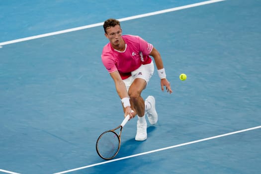 MELBOURNE, AUSTRALIA - JANUARY 19: Jiri Lehecka of Czech Republic hits a forehand to Novak Djokovic of Serbia on day eight of the 2025 Australian Open at Melbourne Park on January 19, 2025 in Melbourne, Australia.