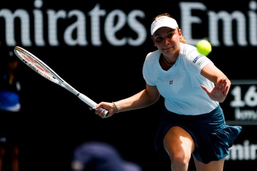 MELBOURNE, AUSTRALIA - JANUARY 19: Donna Vekic of Croatia runs for a forehand to Anastasia Pavlyuchenkova of Russia on day eight of the 2025 Australian Open at Melbourne Park on January 19, 2025 in Melbourne, Australia.