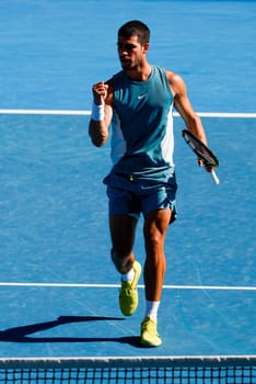 MELBOURNE, AUSTRALIA - JANUARY 19: Carlos Alcaraz of Spain reacts to winning a point against Jack Draper of Great Britain on day eight of the 2025 Australian Open at Melbourne Park on January 19, 2025 in Melbourne, Australia.