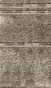 Vertical background texture on a rough concrete grey surface with horizontal indented stripes