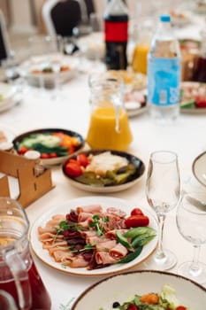 a banquet in a restaurant, a birthday party, a wedding. Beautiful banquet table with dishes.