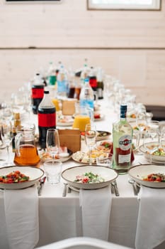 a banquet in a restaurant, a birthday party, a wedding. Beautiful banquet table with dishes.