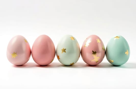 Five elegantly decorated Easter eggs in pastel shades with gold decor on a white background, a symbol of Easter and spring. AI generated.