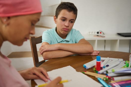 An empathetic and emotionally touching scene between a child and an adult, showcasing emotional connection and care through creative activities, highlighting the depth of human compassion and challenges in life.