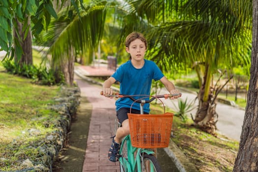 Boy tourist cycling through the charming village of Bacalar, Mexico. Quintana Roo travel, scenic bike paths, and eco-friendly exploration concept.