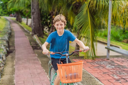 Boy tourist cycling through the charming village of Bacalar, Mexico. Quintana Roo travel, scenic bike paths, and eco-friendly exploration concept.