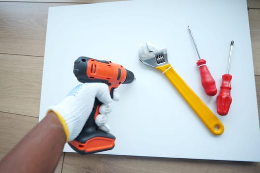 Tool arrangement shows preparation for a home improvement activity.