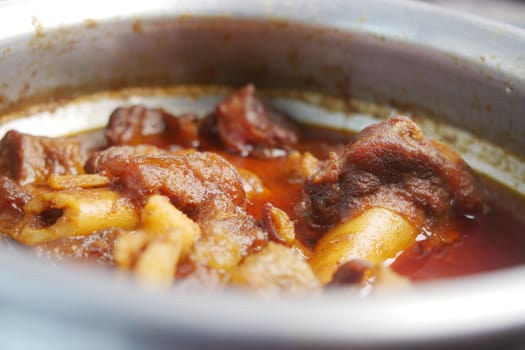 Tender beef chunks simmer in a rich sauce exuding delicious aromas.