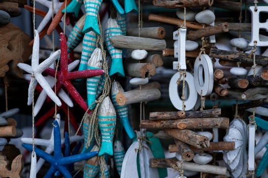 Colorful nautical decorations with driftwood and starfish display.