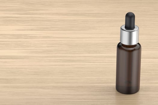 Brown glass dropper bottle on wooden desk