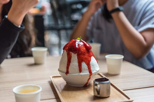 Bingsu or Bingsoo (Patbingsu) is a popular Korean shaved ice dessert with sweet toppings that may include chopped fruit, condensed milk, fruit syrup, and varieties with ingredients