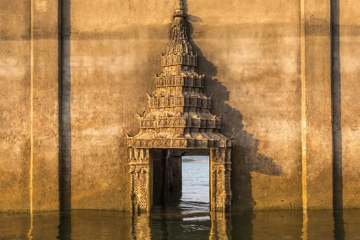 Landscape of Songkaria river with old structure of Wat Wang Wiwekaram underwater from building a dam is a travel unseen in Sangkhla buri Kanchanaburi, Thailand