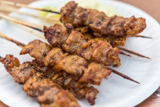 Mala is Grilled meat (Beef, Pork, Chickens or Mushroom) with chilli sauce and chinese hot spicy herb (Sichuan Pepper) for sale at Thai street food market or restaurant in Bangkok Thailand