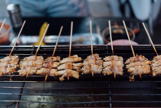 Mala is Grilled meat (Beef, Pork, Chickens or Mushroom) with chilli sauce and chinese hot spicy herb (Sichuan Pepper) for sale at Thai street food market or restaurant in Bangkok Thailand