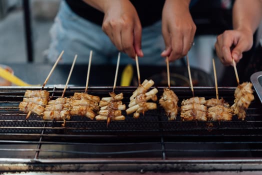 Mala is Grilled meat (Beef, Pork, Chickens or Mushroom) with chilli sauce and chinese hot spicy herb (Sichuan Pepper) for sale at Thai street food market or restaurant in Bangkok Thailand