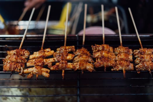 Mala is Grilled meat (Beef, Pork, Chickens or Mushroom) with chilli sauce and chinese hot spicy herb (Sichuan Pepper) for sale at Thai street food market or restaurant in Bangkok Thailand