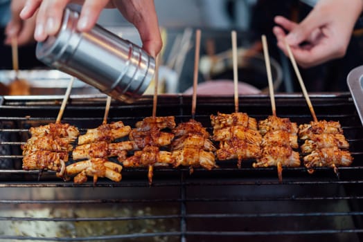 Mala is Grilled meat (Beef, Pork, Chickens or Mushroom) with chilli sauce and chinese hot spicy herb (Sichuan Pepper) for sale at Thai street food market or restaurant in Bangkok Thailand
