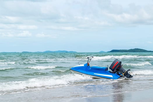 Travel in nature at a beach and tropical sea with blue sky and have a retro water scooter boat for adventure tourism with motor sport water
