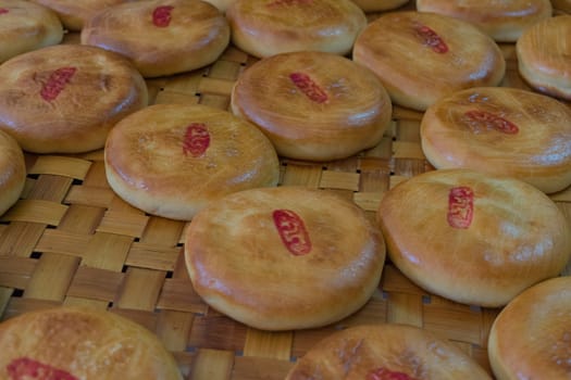 Chinese pastry or Moon cake is asia dessert on traditional basket