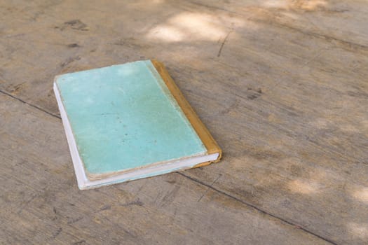 Vintage old Note book on a wood table