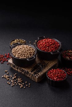 White allspice in a ceramic bowl on a dark concrete background